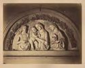 [Lunetta con Madonna col Bambino e san Giovanni Battista e santa: terracotta smaltata: Montepulciano]