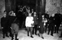 [Ludwig Siebert seguito dal rettore Alessandro Ghigi e da altri esce dall'aula magna dell'università di Bologna: 22 maggio 1941]
